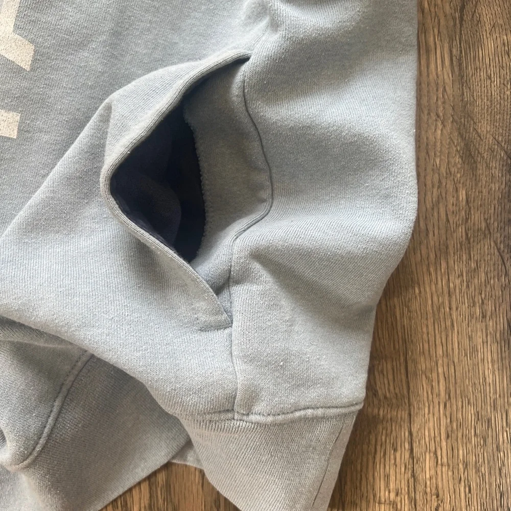The North Face Blue Sweater with Iconic Branding